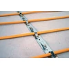 Slika 12/15 -MAGNUM Cable pričvršćivanje unutrašnjeg grejnog kabela na beton metalnim trakama